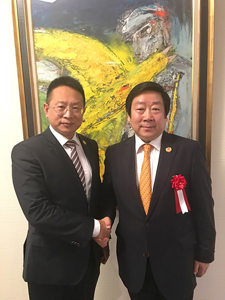 Picture of Boqing Zhang and Mr. Qinglin Pan, Standing Committee of the Chinese Fede